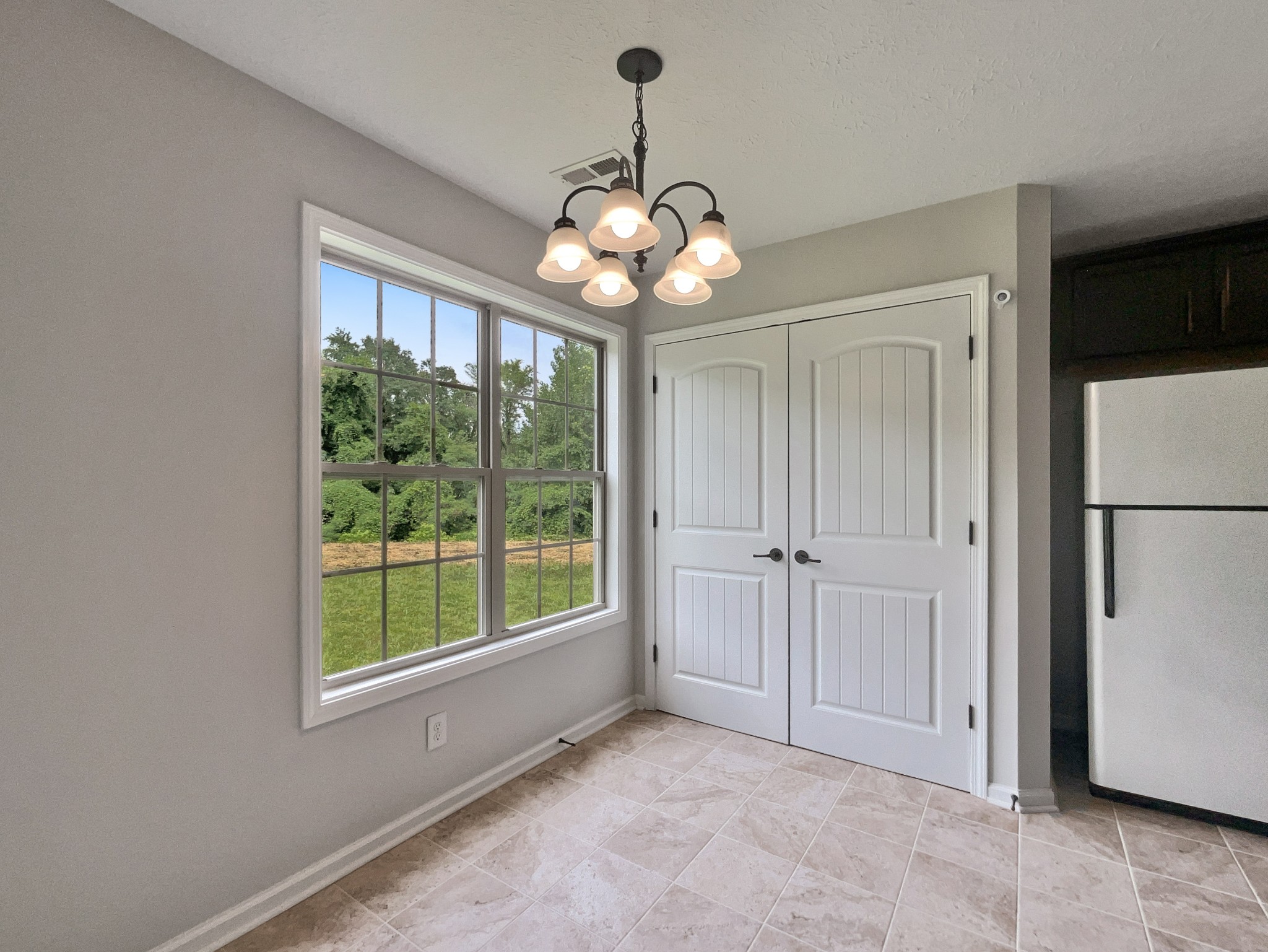 851 Salem Road Clarksville, TN 37040 - Photo 15 of 21 a view of a room with a large window and refrigerator