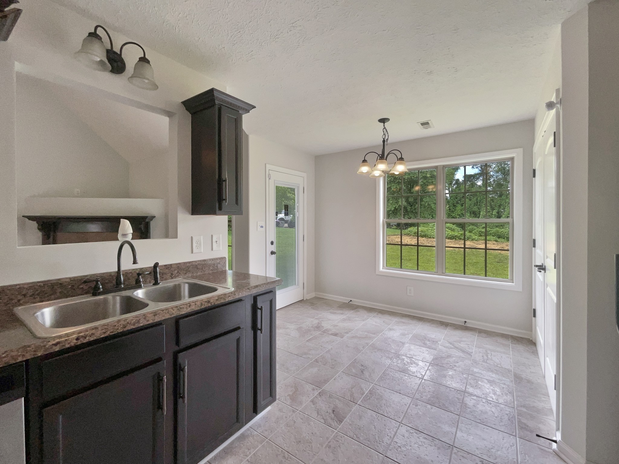 851 Salem Road Clarksville, TN 37040 - Photo 16 of 21 a bathroom with a double vanity sink and mirror