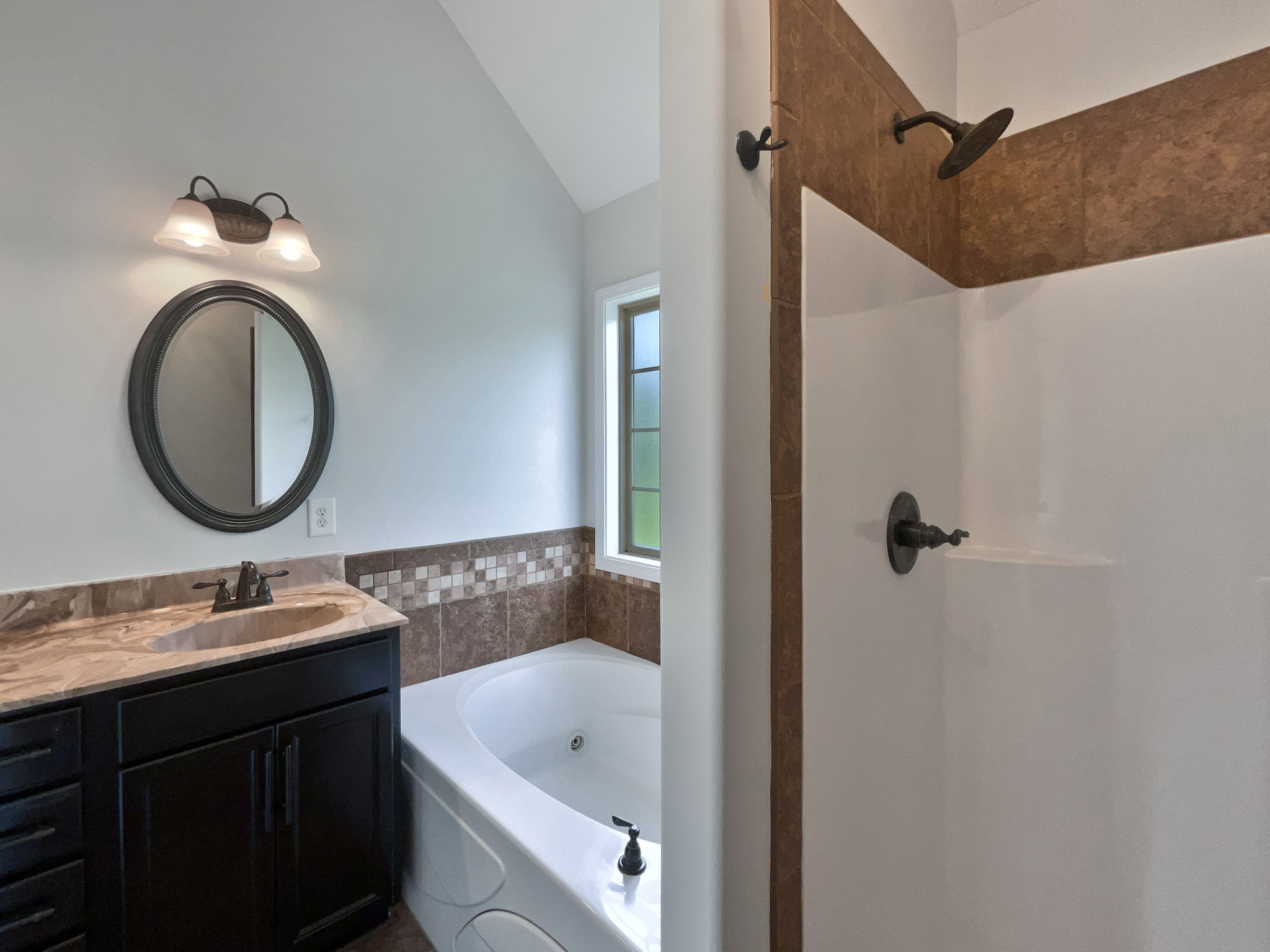 851 Salem Road Clarksville, TN 37040 - Photo 18 of 21 a bathroom with a sink and a mirror