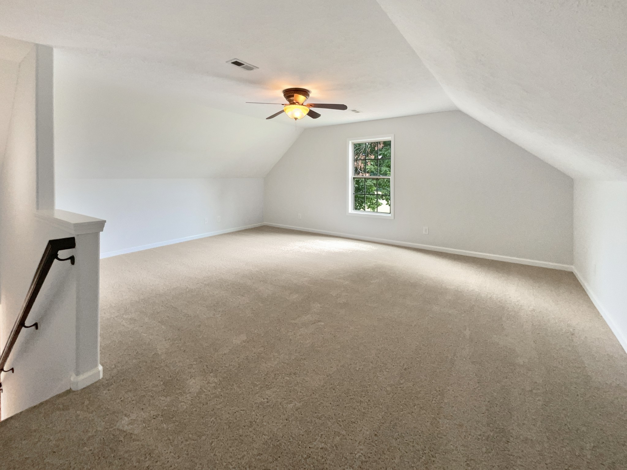 851 Salem Road Clarksville, TN 37040 - Photo 19 of 21 an empty room with windows and ceiling fan view
