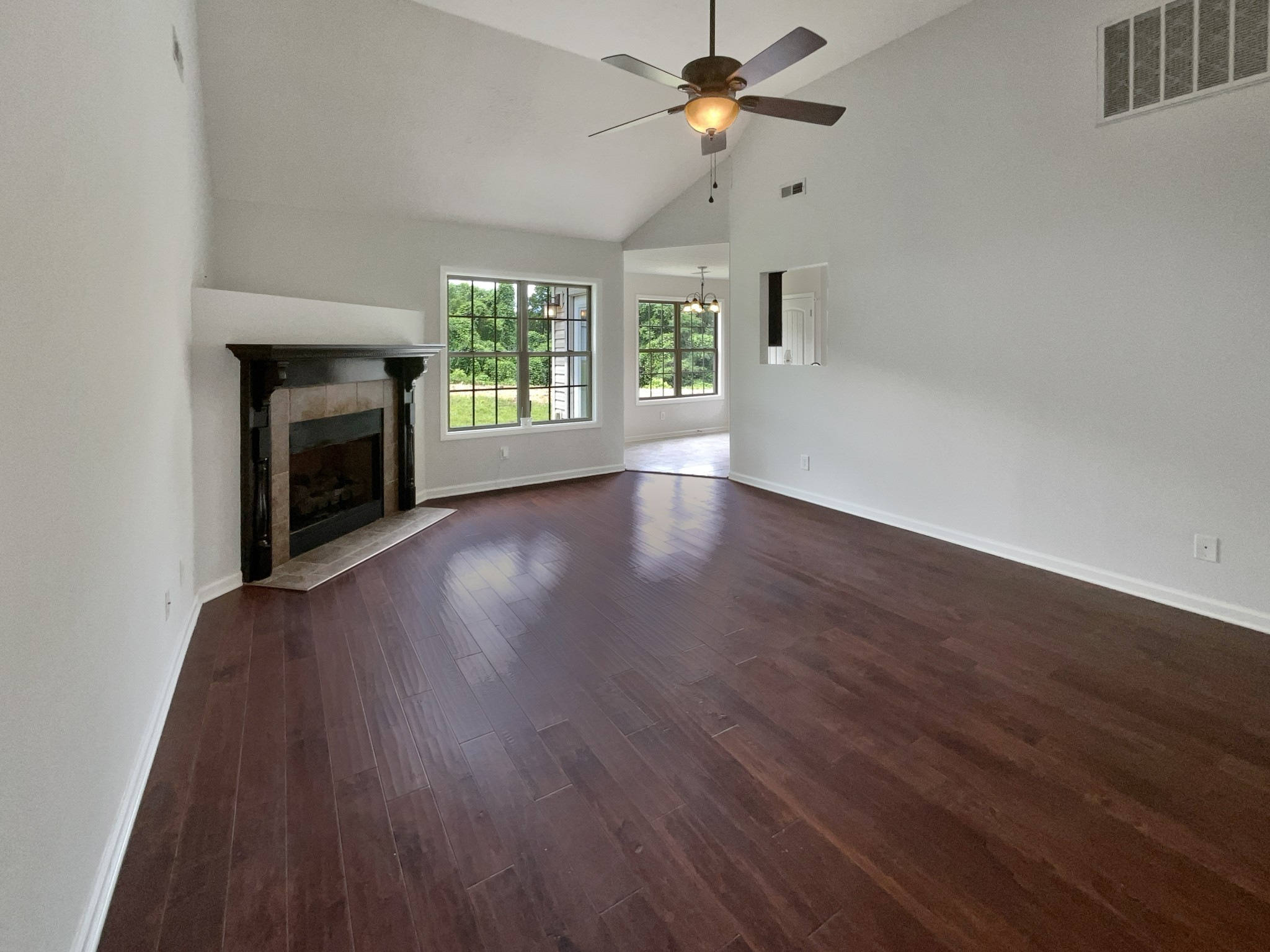 851 Salem Road Clarksville, TN 37040 - Photo 3 of 21 wooden floor in an empty room with a window