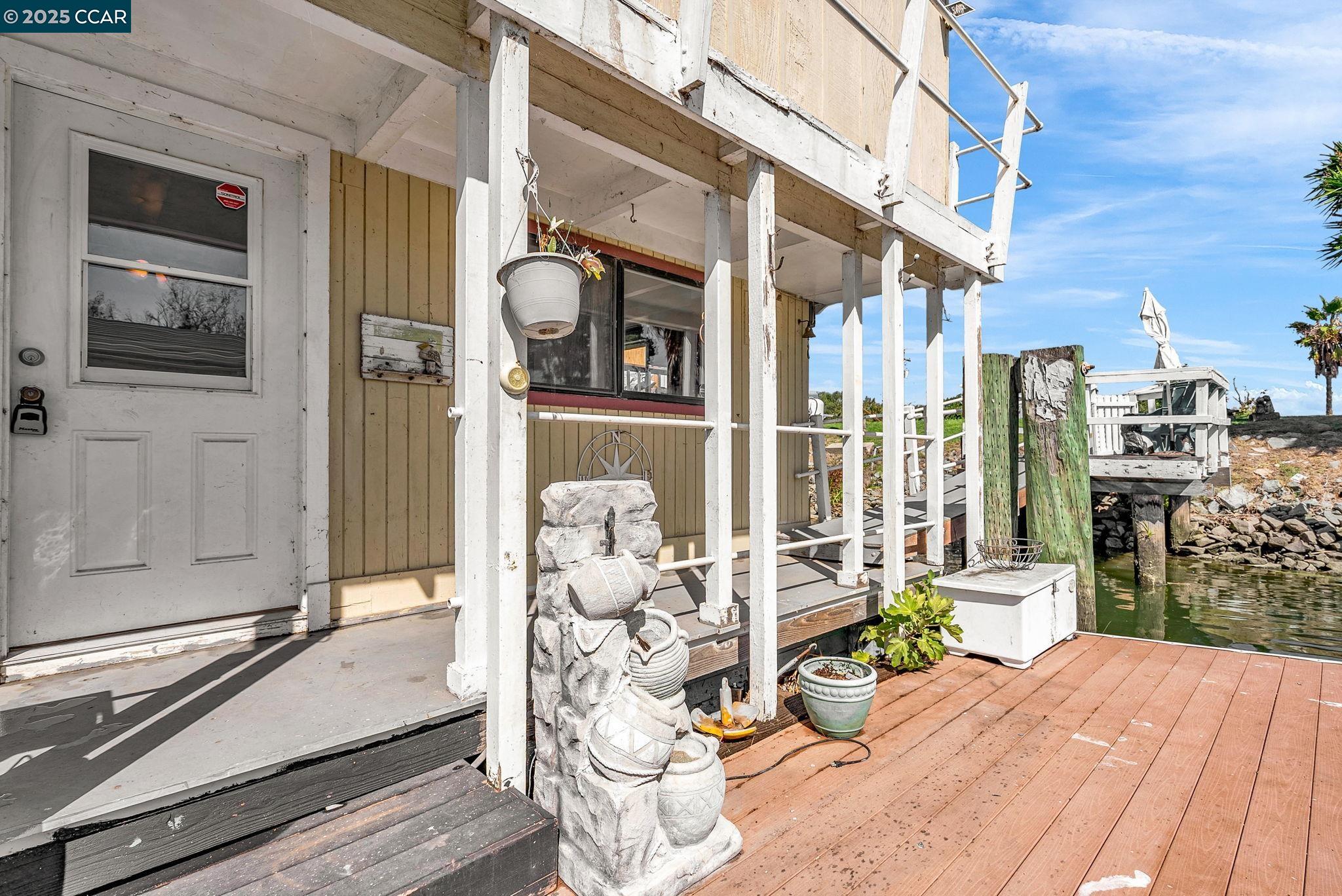1818 Taylor Road Bethel Island, CA 94511 - Photo 12 of 59 a view of a chairs and table in the patio