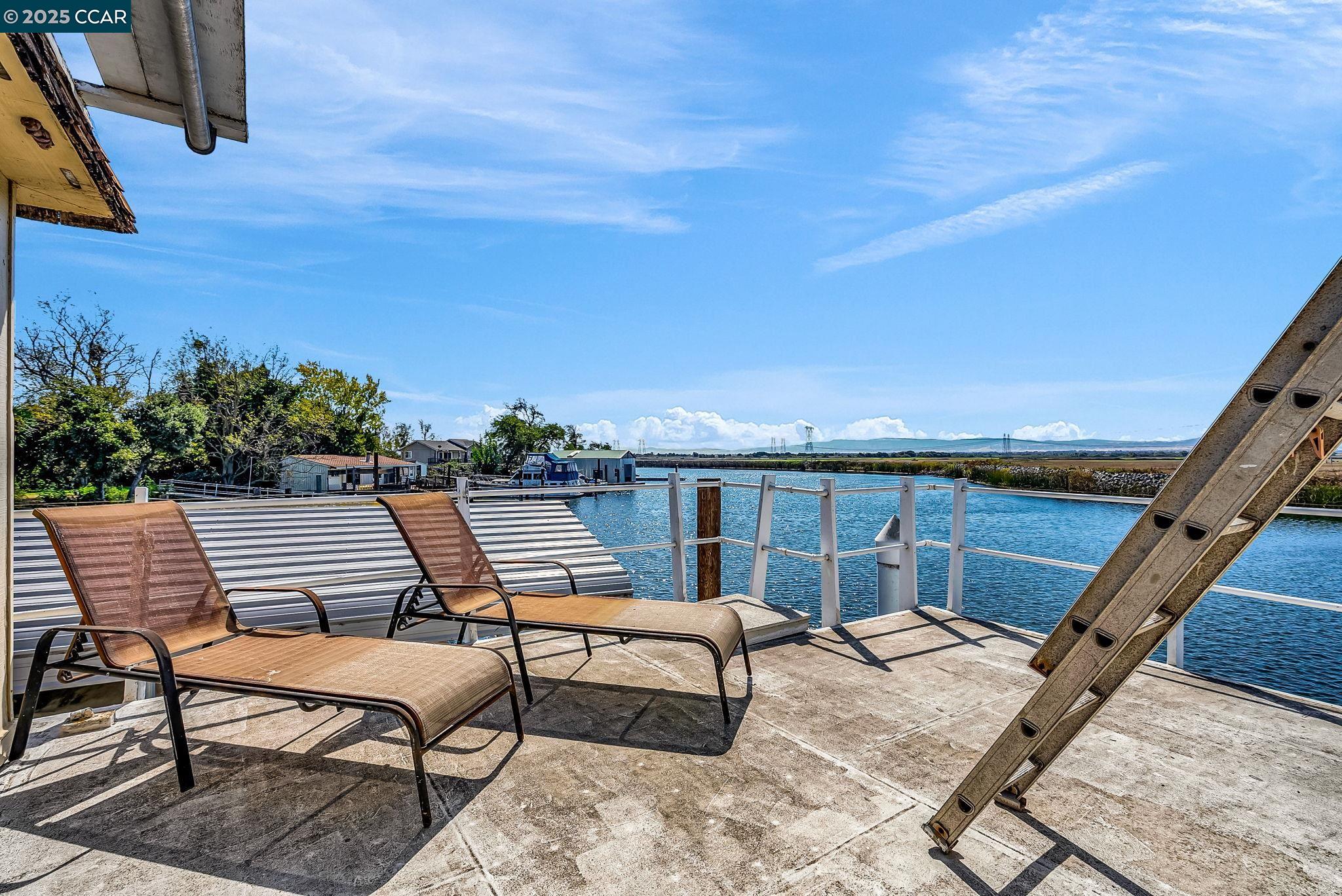 1818 Taylor Road Bethel Island, CA 94511 - Photo 40 of 59 a roof deck with couches and potted plants