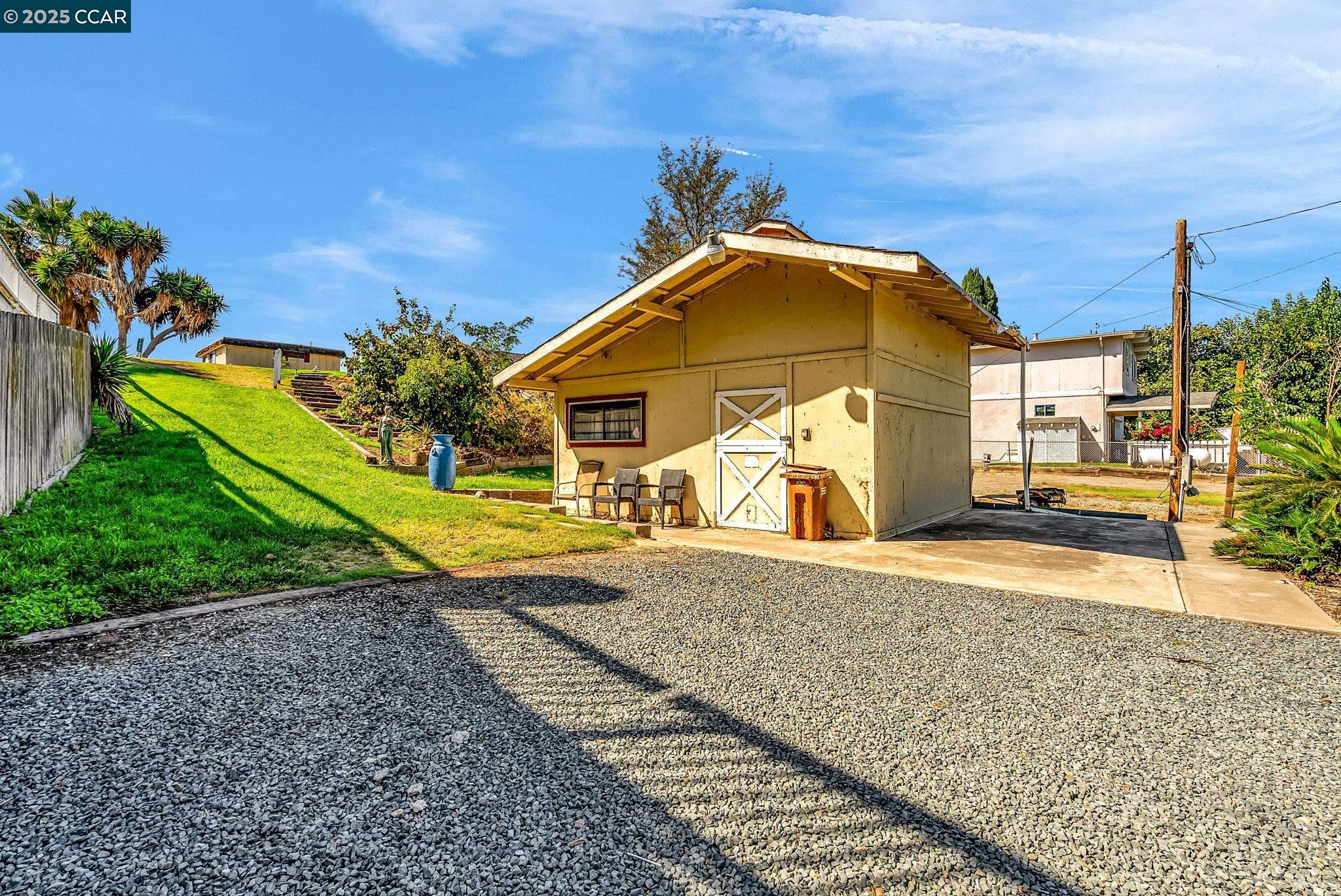 1818 Taylor Road Bethel Island, CA 94511 - Photo 46 of 59 a view of a house with a yard