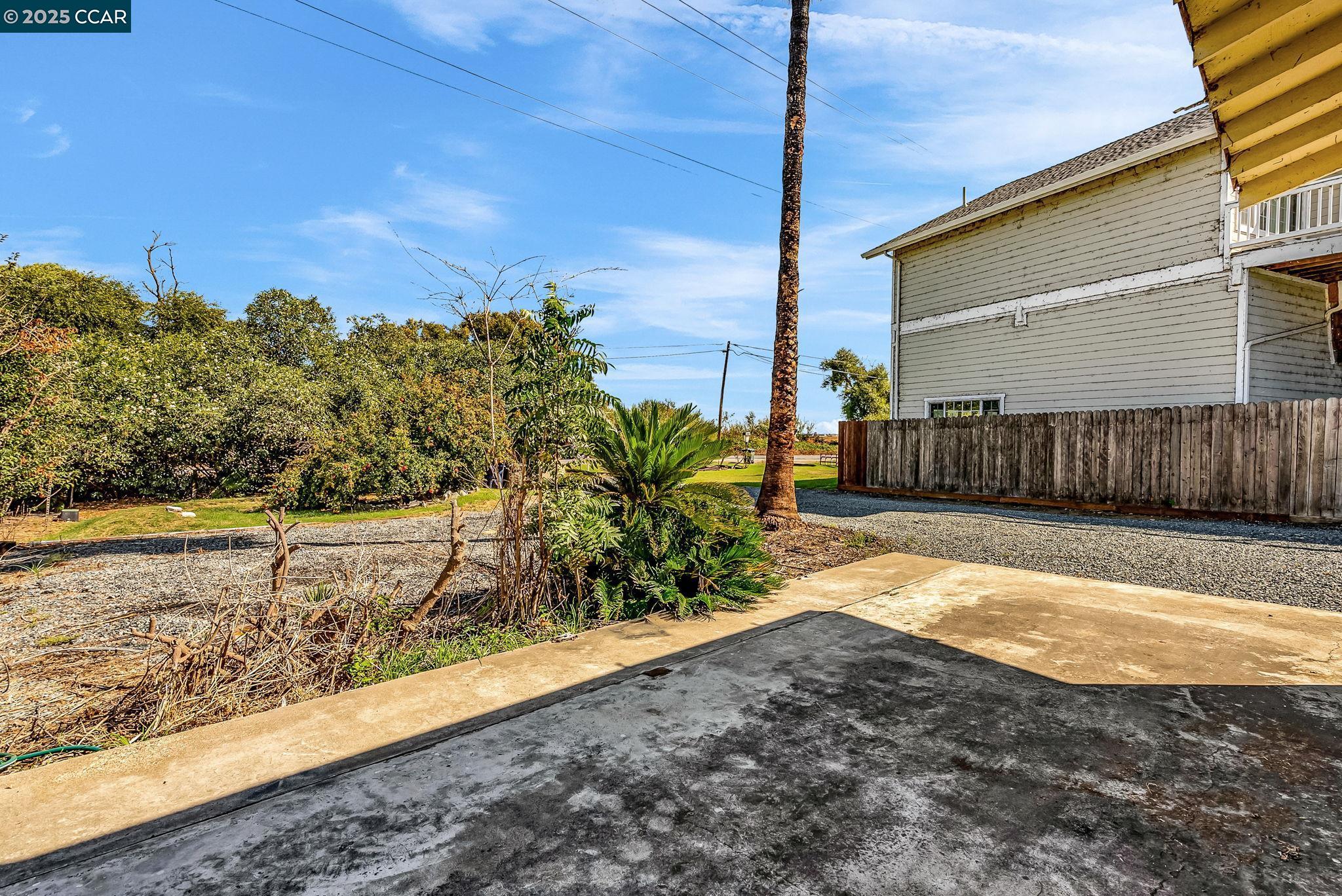 1818 Taylor Road Bethel Island, CA 94511 - Photo 50 of 59 a view of a yard with wooden fence