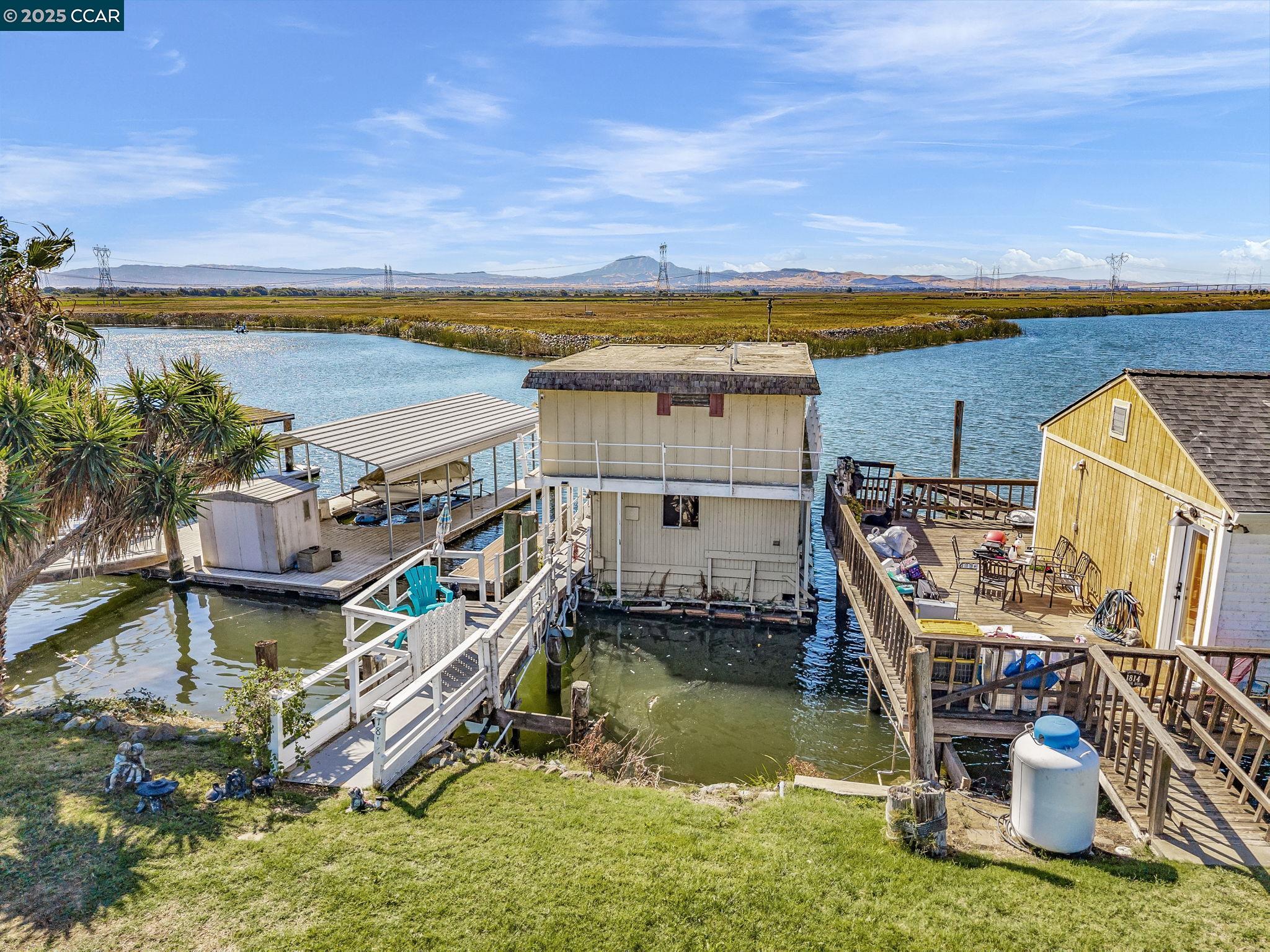 1818 Taylor Road Bethel Island, CA 94511 - Photo 5 of 59 an aerial view of a house with a ocean view