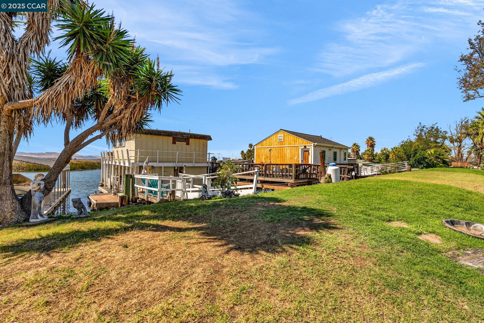 1818 Taylor Road Bethel Island, CA 94511 - Photo 52 of 59 a view of house with outdoor space and swimming pool