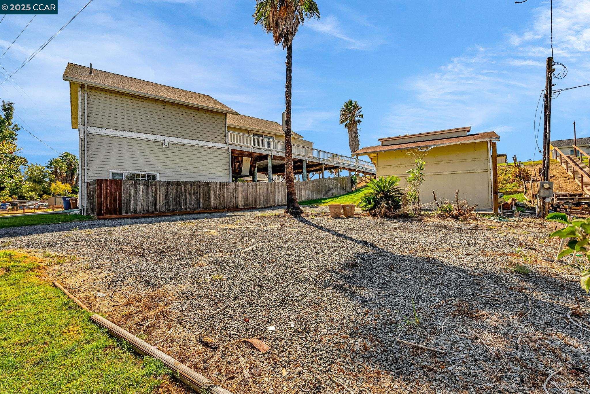 1818 Taylor Road Bethel Island, CA 94511 - Photo 54 of 59 a view of a backyard with a tv