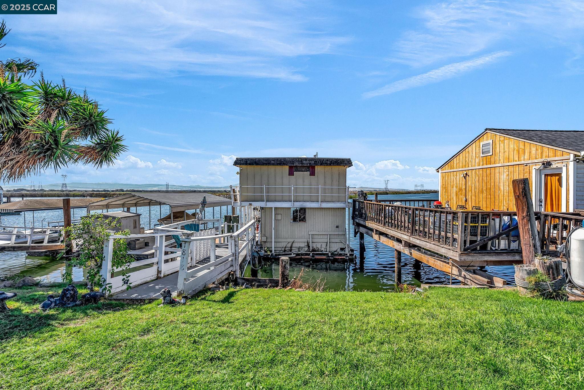 1818 Taylor Road Bethel Island, CA 94511 - Photo 6 of 59 a view of a house with a backyard