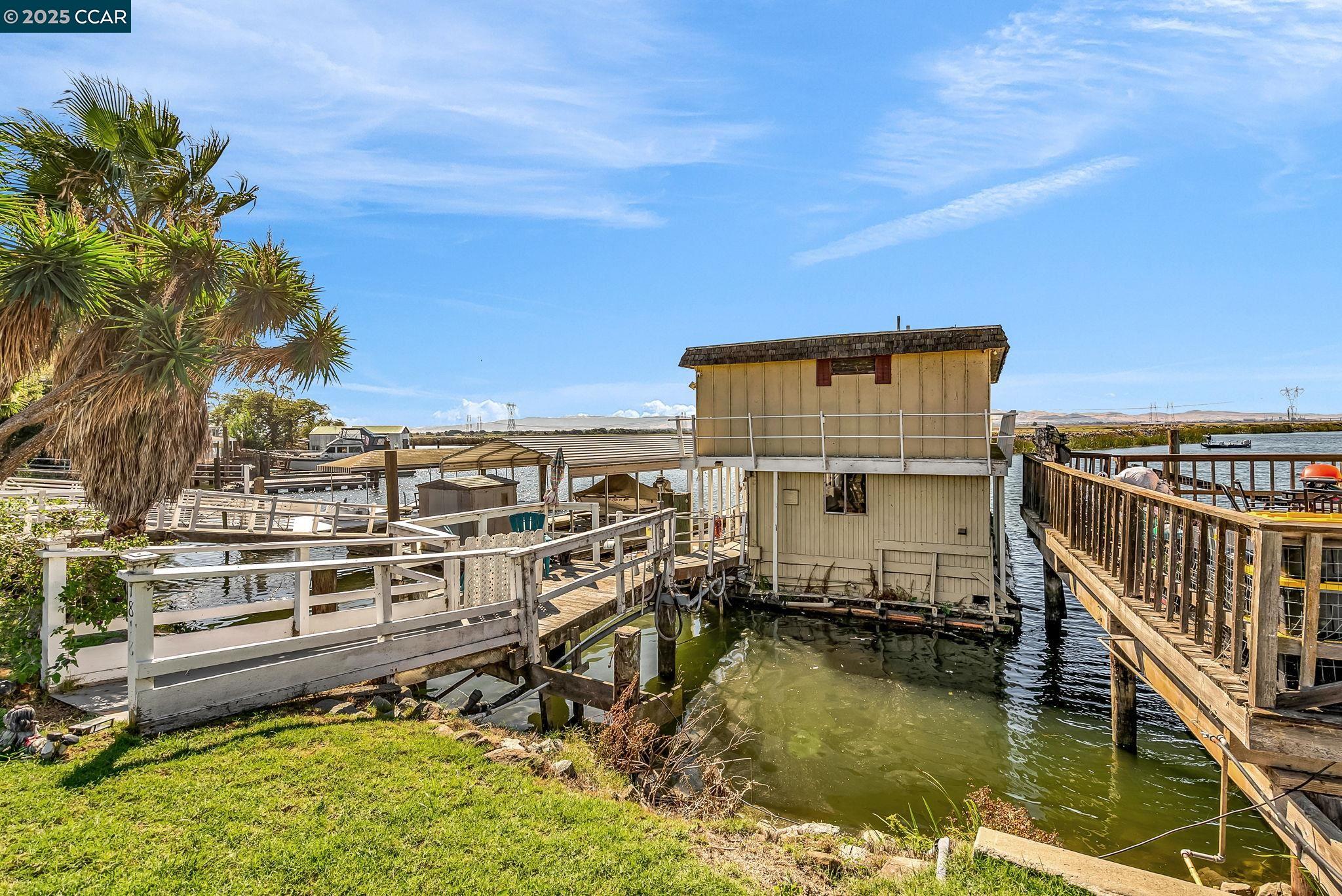 1818 Taylor Road Bethel Island, CA 94511 - Photo 9 of 59 a view of a balcony with chairs