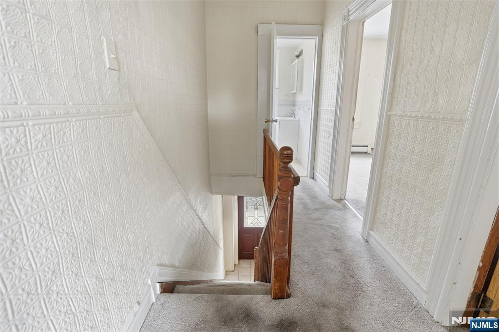 209 Hamilton Street Harrison, NJ 07029 - Photo 11 of 26 a view of a hallway