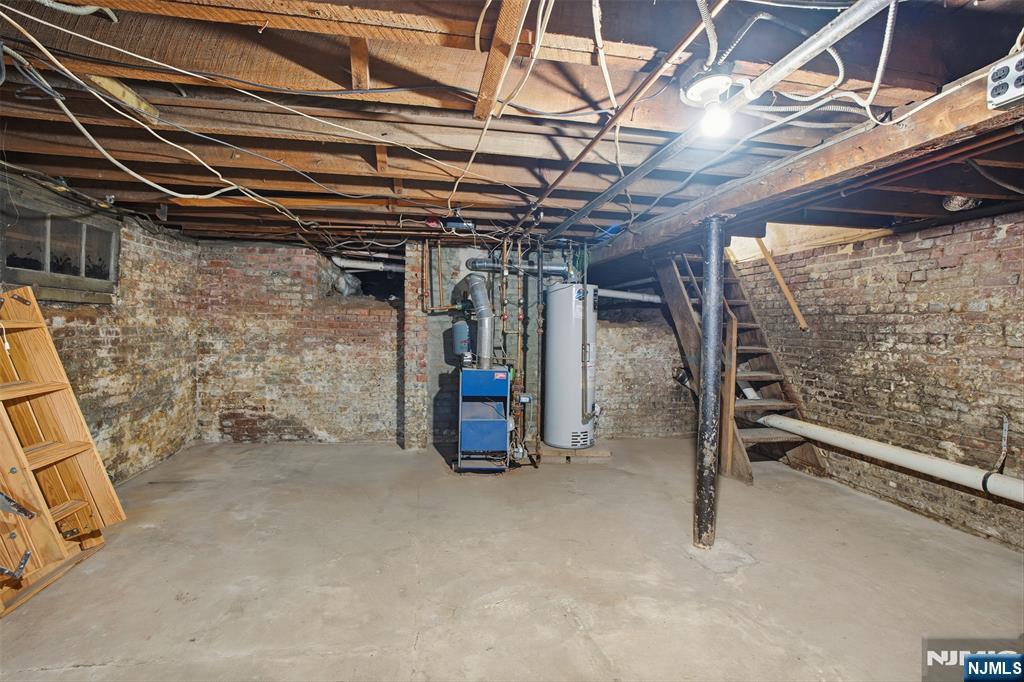 209 Hamilton Street Harrison, NJ 07029 - Photo 20 of 26 a view of an empty room with wooden roof