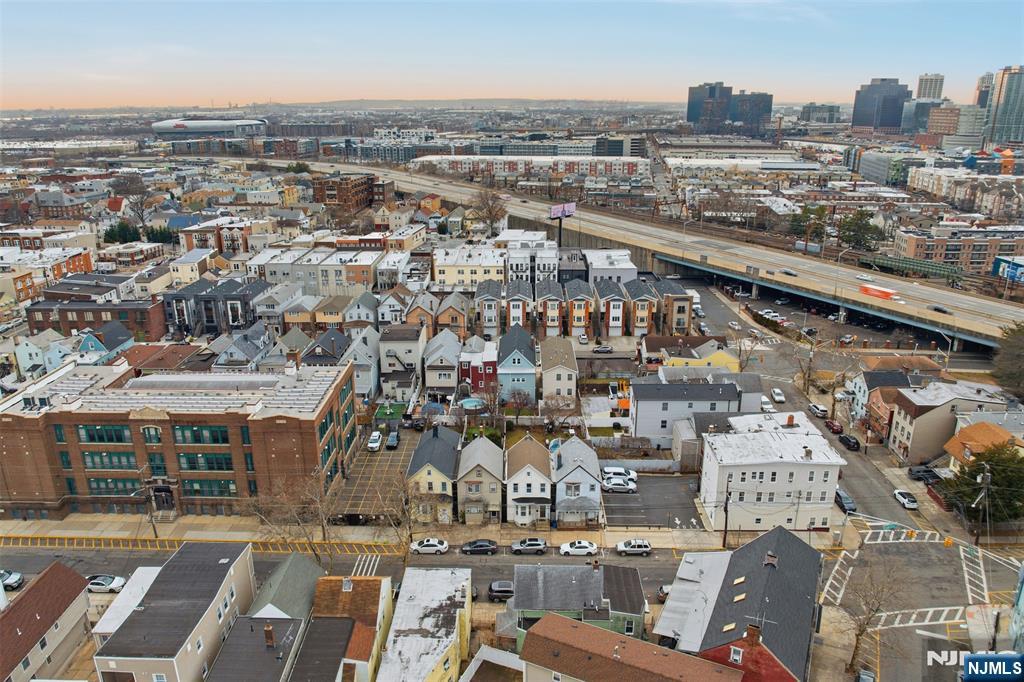 209 Hamilton Street Harrison, NJ 07029 - Photo 23 of 26 an aerial view of a city with lots of residential buildings