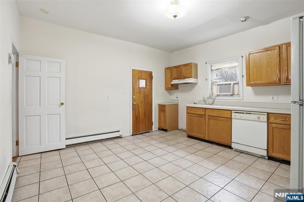 209 Hamilton Street Harrison, NJ 07029 - Photo 8 of 26 a view of a kitchen with a sink