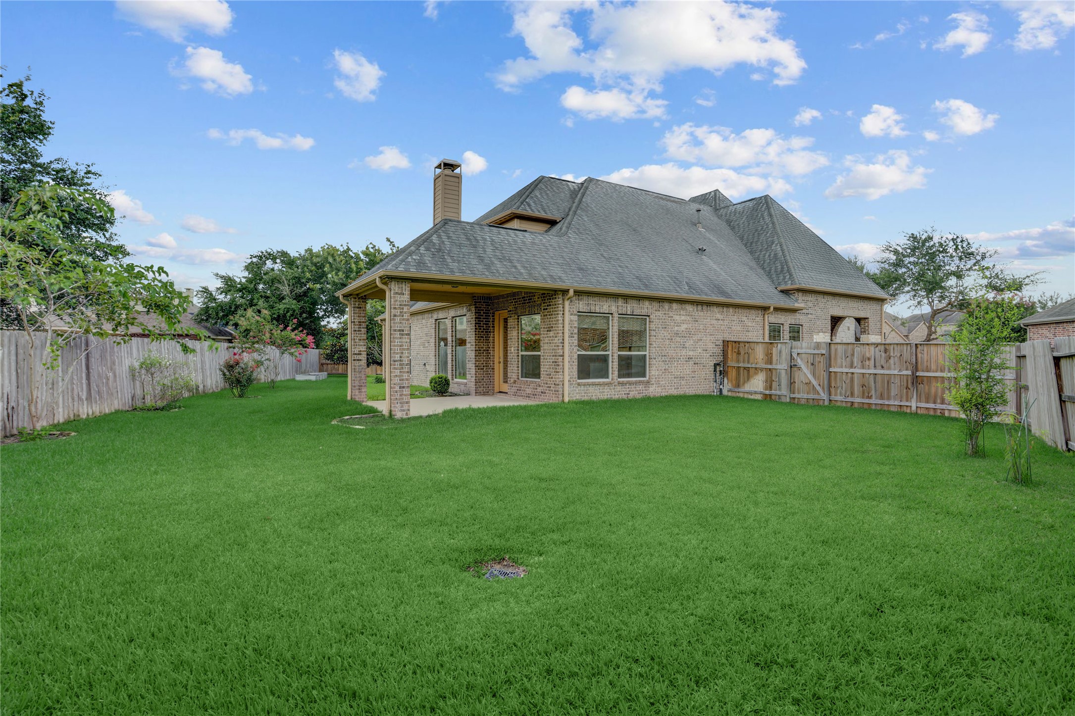 3002 Currant Drive Manvel, TX 77578 - Photo 34 of 43 a view of a house with a big yard