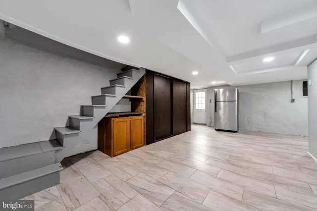 a bathroom with a sink and mirror