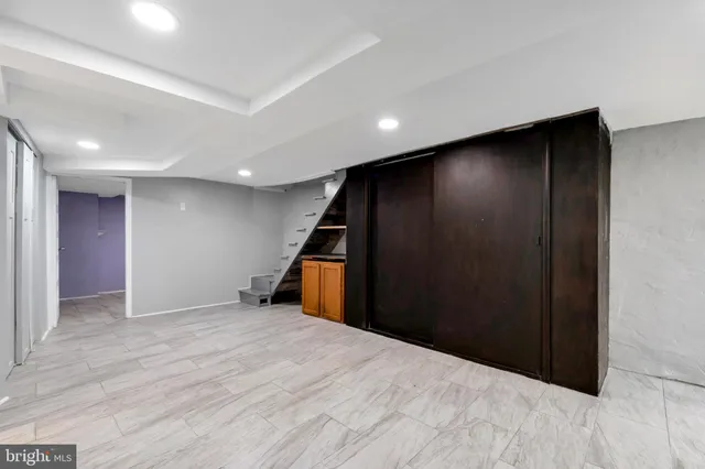 a room with a bench and a table