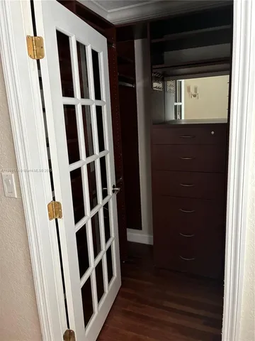 a view of a door with wooden door