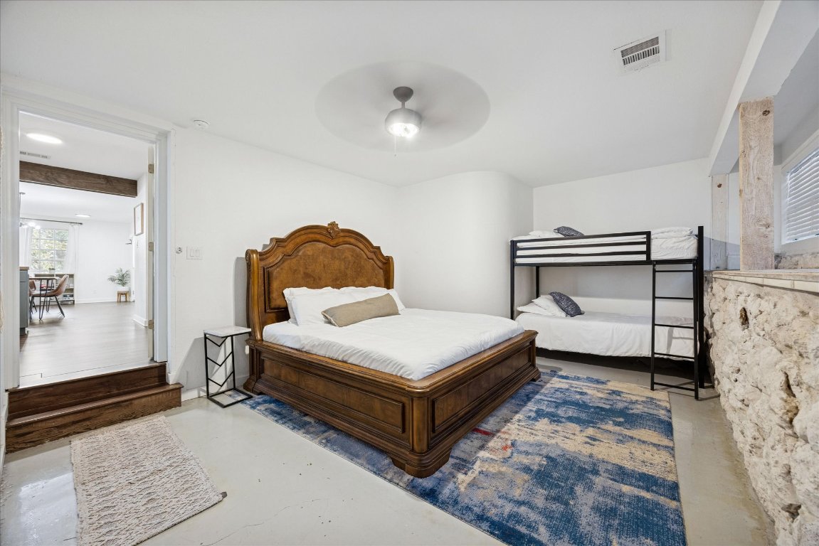 604 Pressler Street Austin, TX 78703 - Photo 14 of 40 Bedroom with concrete floors and ceiling fan