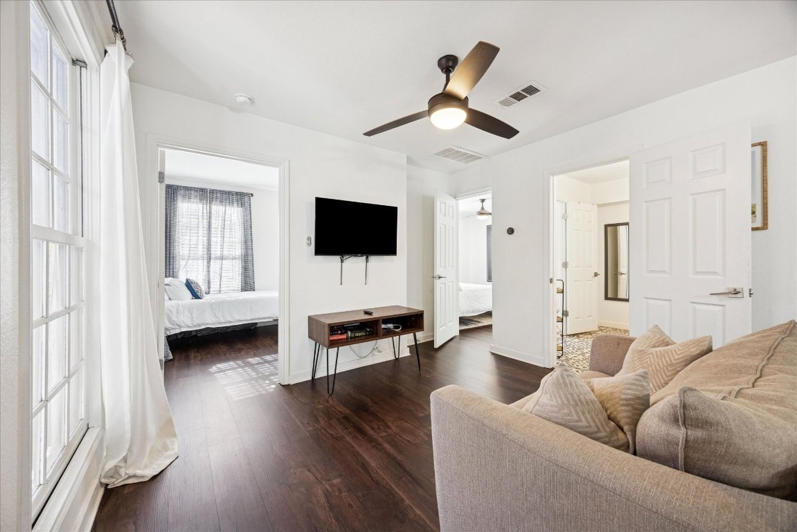 604 Pressler Street Austin, TX 78703 - Photo 8 of 40 Living room with dark wood-style floors and ceiling fan