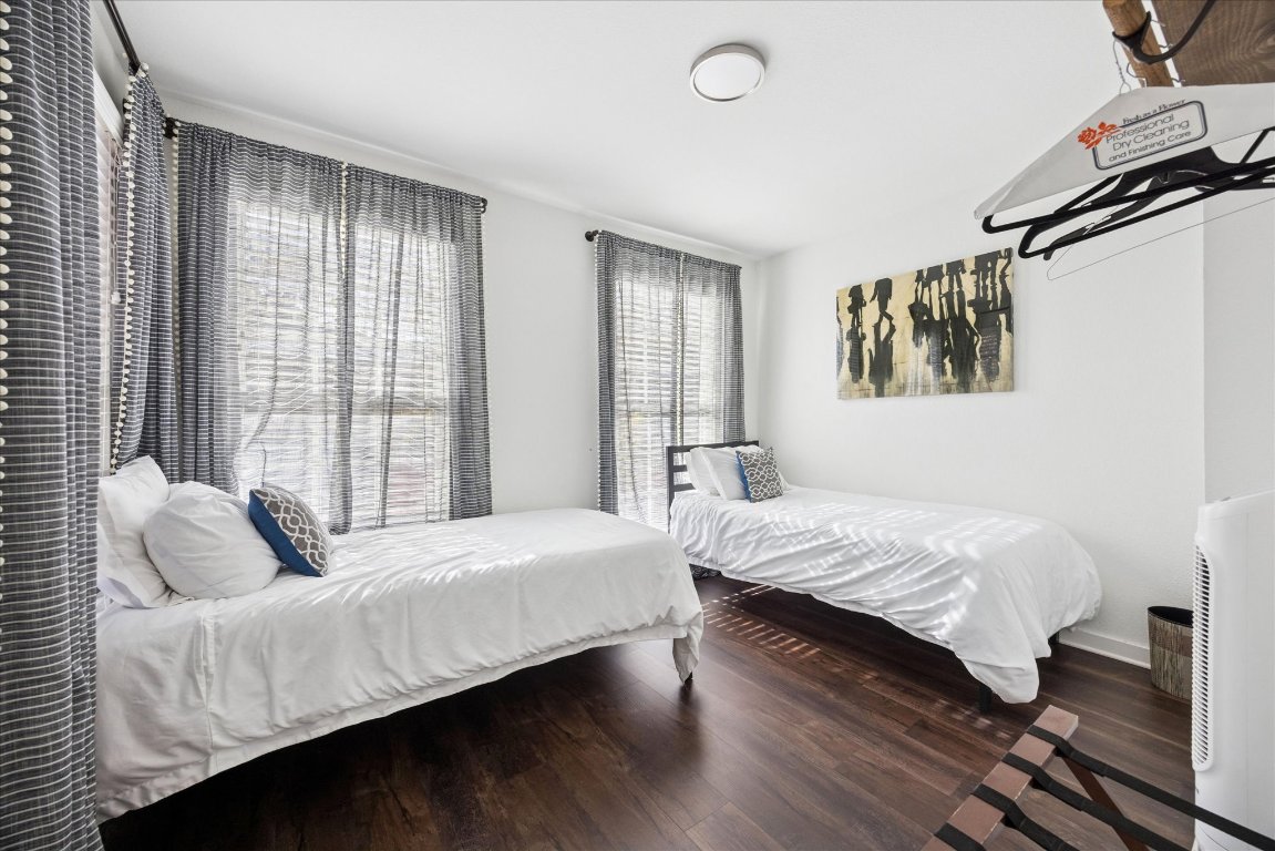 604 Pressler Street Austin, TX 78703 - Photo 9 of 40 Bedroom featuring wood finished floors and heating unit