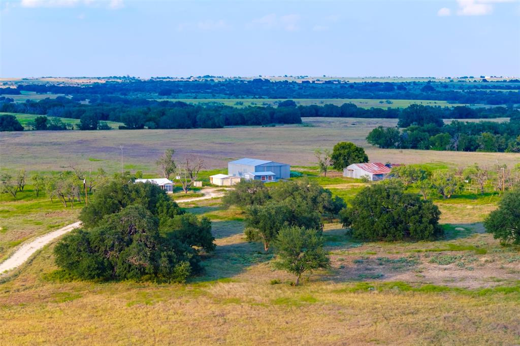 1515 County Road 510 Hamilton, TX 76531 - Photo 4 of 12 a view of a lake with a mountain in the background
