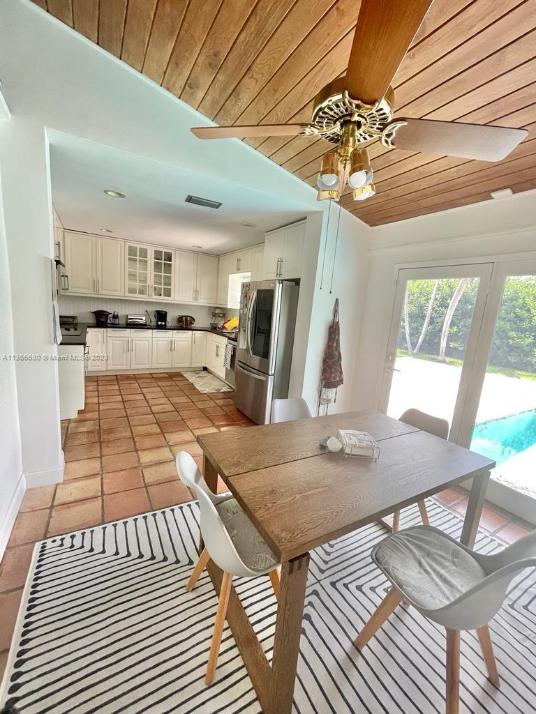 Pinecrest Pinecrest, FL 33156 - Photo 16 of 25 a view of a dining room with furniture