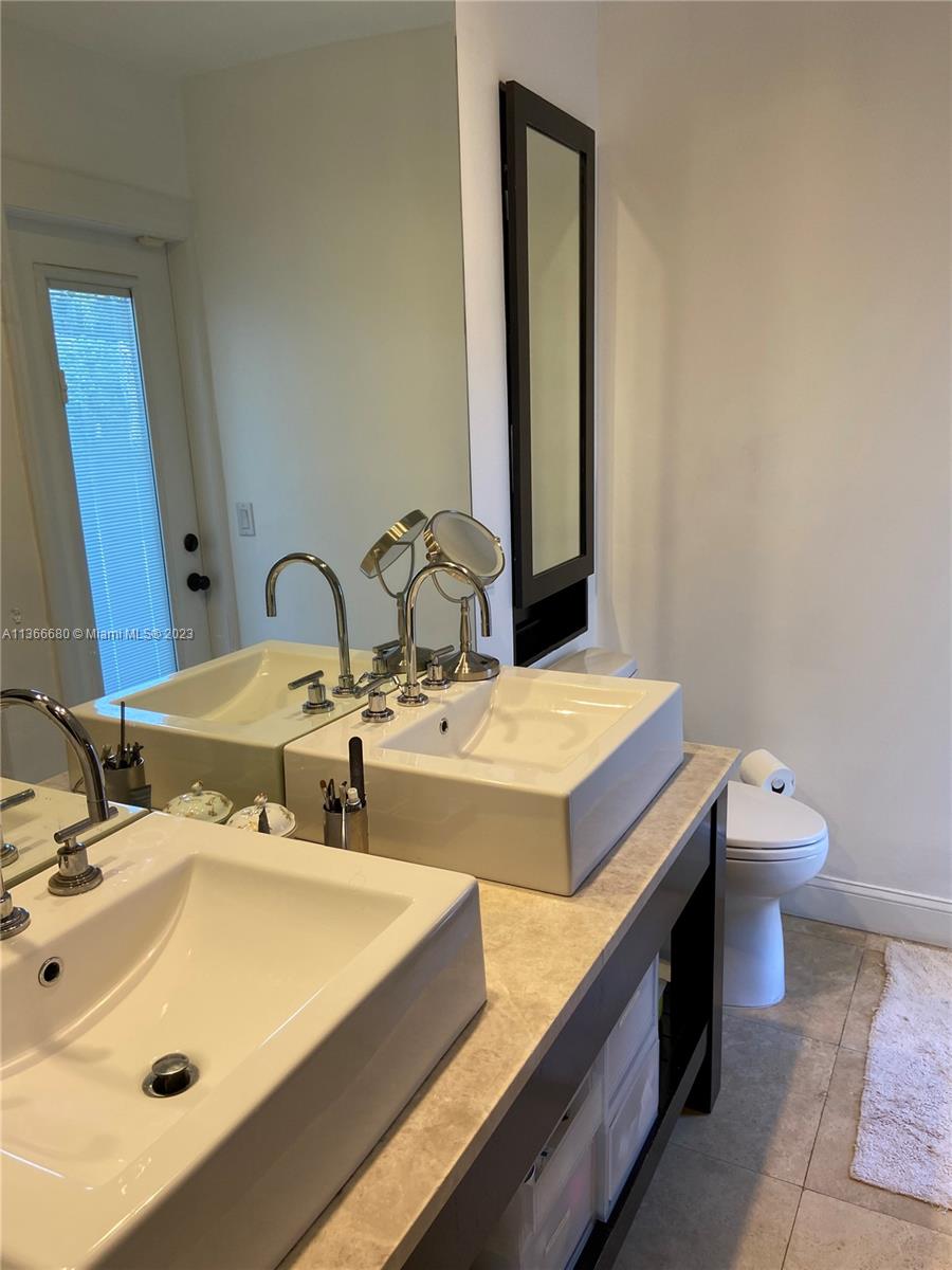 Pinecrest Pinecrest, FL 33156 - Photo 23 of 25 a bathroom with a sink and a toilet