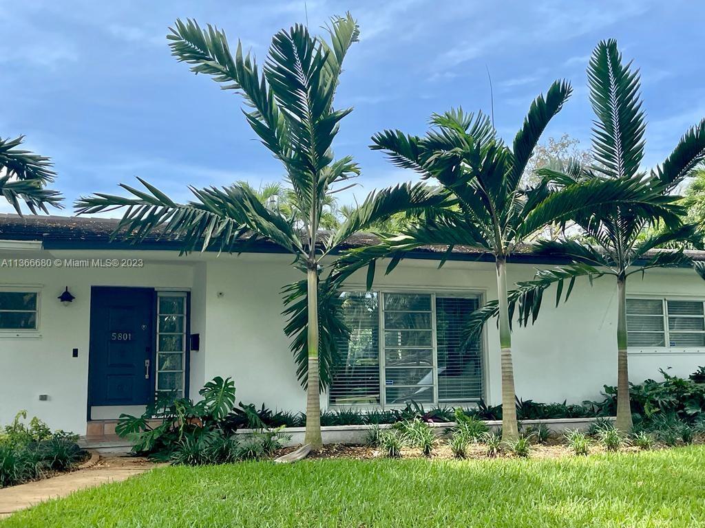 Pinecrest Pinecrest, FL 33156 - Photo 3 of 25 a front view of house with yard and green space