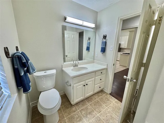 a bathroom with a sink and a toilet