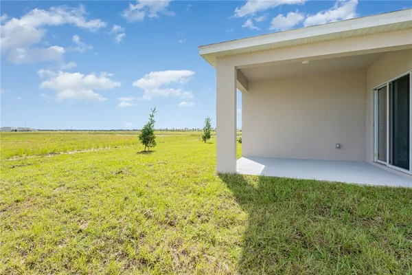 a view of an ocean kitchen and a yard