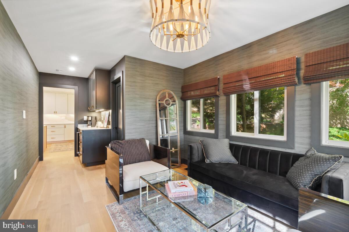 11900 Viewcrest Terrace Silver Spring, MD 20902 - Photo 16 of 69 a living room with furniture and a large window