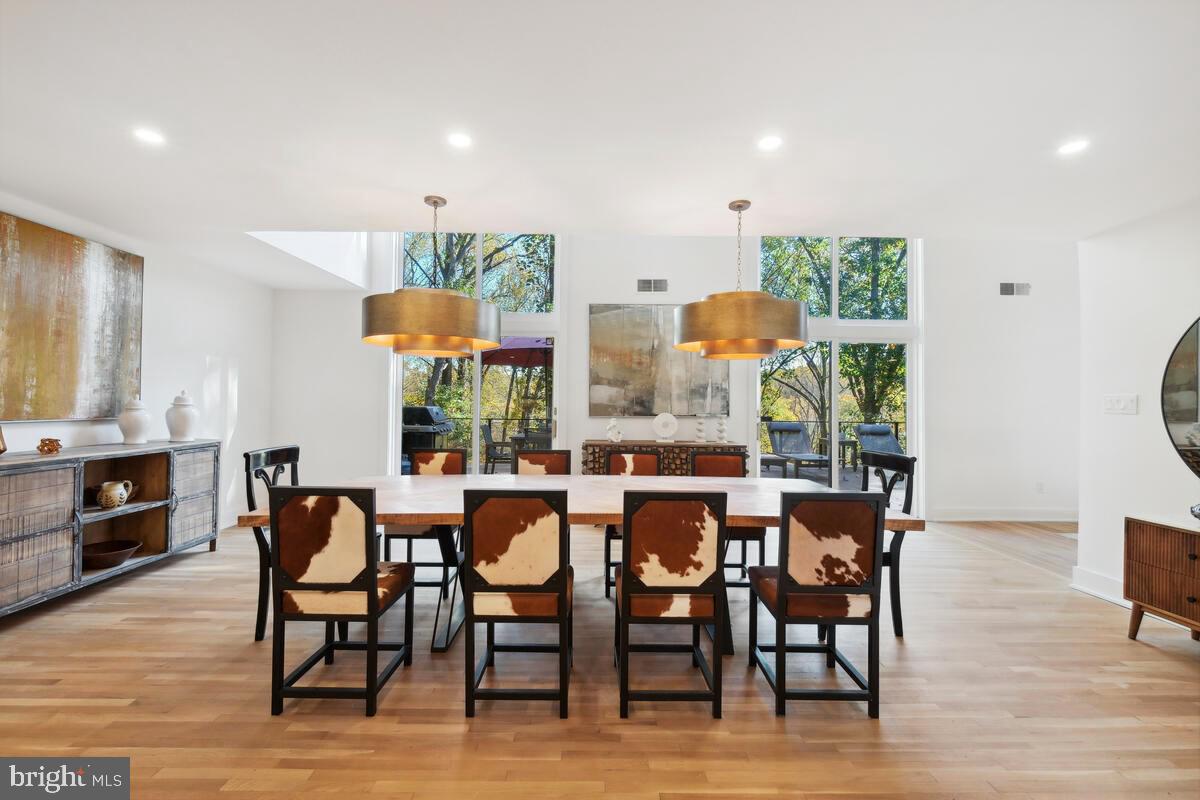 11900 Viewcrest Terrace Silver Spring, MD 20902 - Photo 21 of 69 a view of a dining room with furniture window and wooden floor