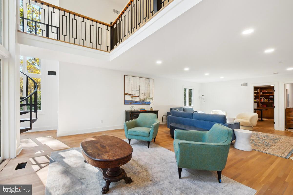 11900 Viewcrest Terrace Silver Spring, MD 20902 - Photo 23 of 69 a living room with furniture and a rug