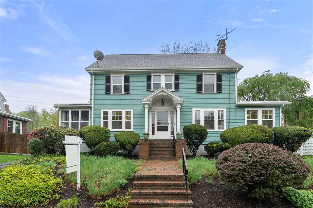 71 Bow Road Belmont, MA 02478 - Photo 1 of 34 a front view of a house with a yard