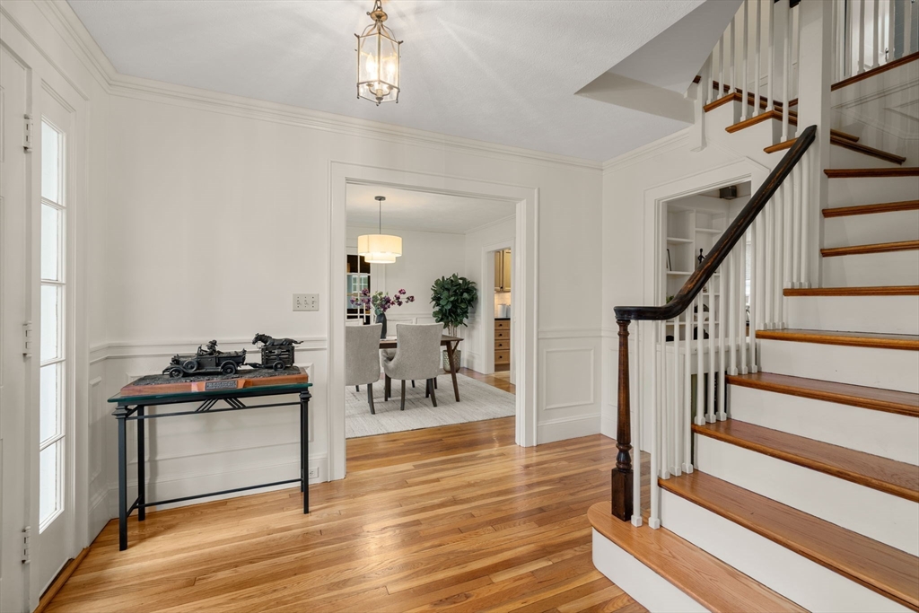 71 Bow Road Belmont, MA 02478 - Photo 8 of 34 a view of a room with wooden floor and stairs