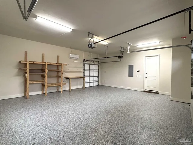 a bathroom with a granite countertop toilet