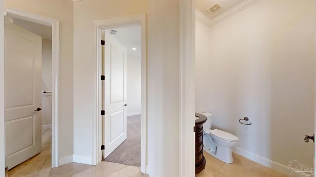 an outdoor space with swimming pool and furniture