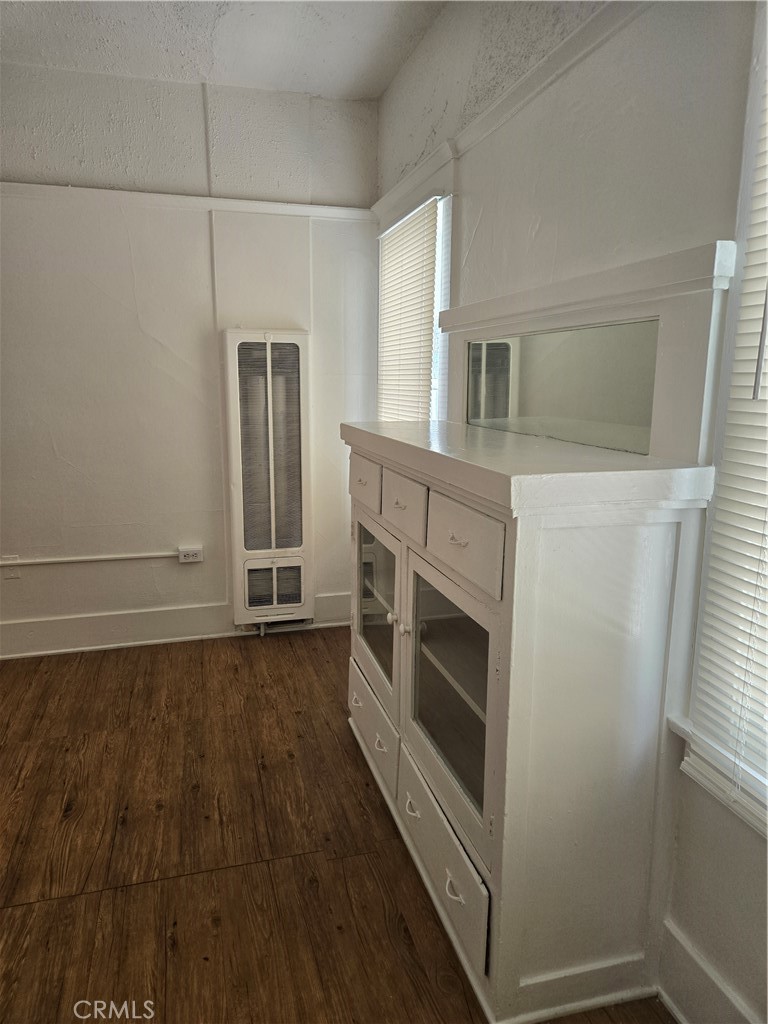 942 2nd Street, Unit 10 Long Beach, CA 90802 - Photo 15 of 28 a view of a livingroom with wooden floor and staircase