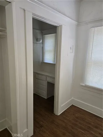 a view of a room that has a window in it