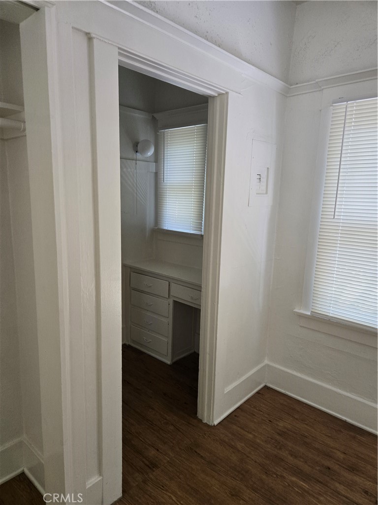 942 2nd Street, Unit 10 Long Beach, CA 90802 - Photo 19 of 28 a view of a small space with wooden floor and a window