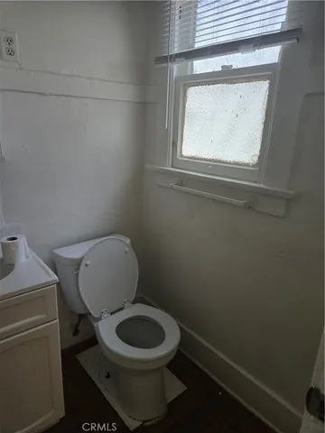 a bathroom with a sink and toilet