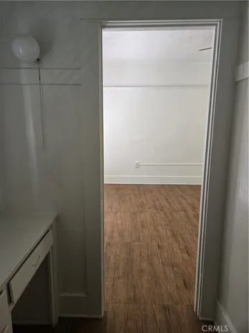 a bathroom with a shower and a window