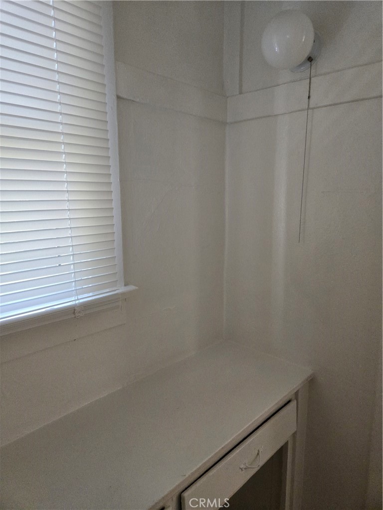 942 2nd Street, Unit 10 Long Beach, CA 90802 - Photo 28 of 28 a bathroom with a shower and a window