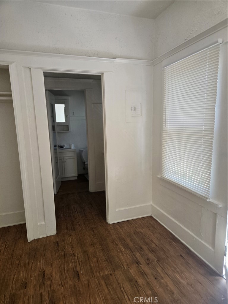 942 2nd Street, Unit 10 Long Beach, CA 90802 - Photo 5 of 28 a view of a room with wooden floor and a window