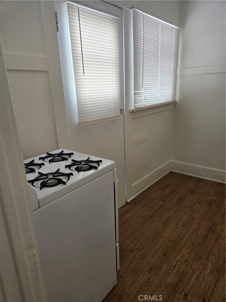 942 2nd Street, Unit 10 Long Beach, CA 90802 - Photo 9 of 28 a view of a storage and utility room with wooden floor