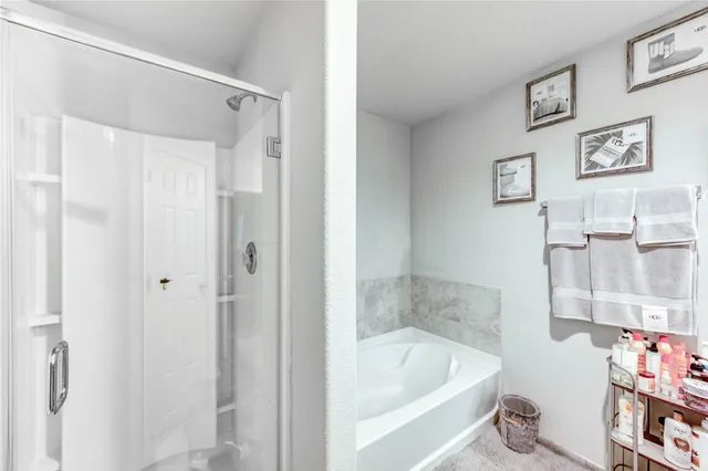 a view of swimming pool with seating area