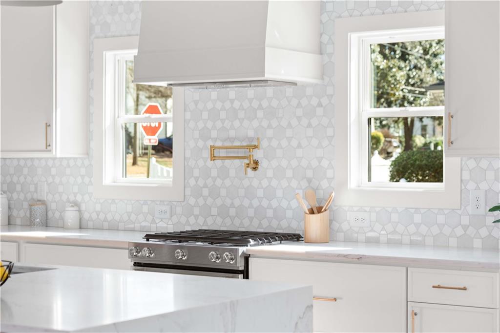 286 Sisson Avenue Northeast Atlanta, GA 30317 - Photo 13 of 56 a bathroom with a sink and a bathtub