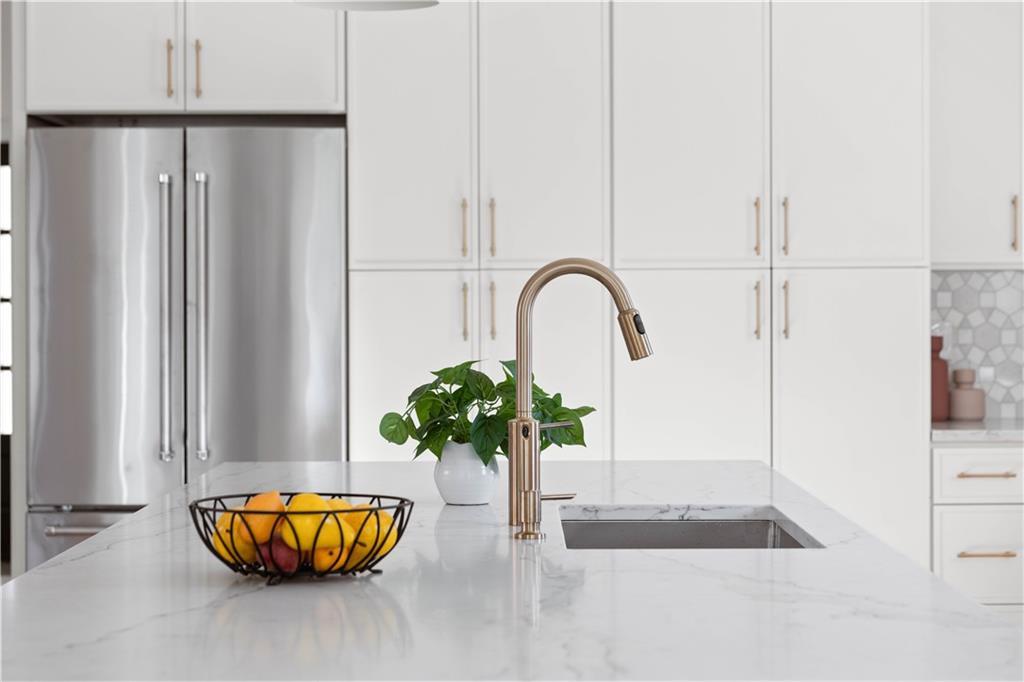 286 Sisson Avenue Northeast Atlanta, GA 30317 - Photo 14 of 56 a vase of flowers sitting on a floor