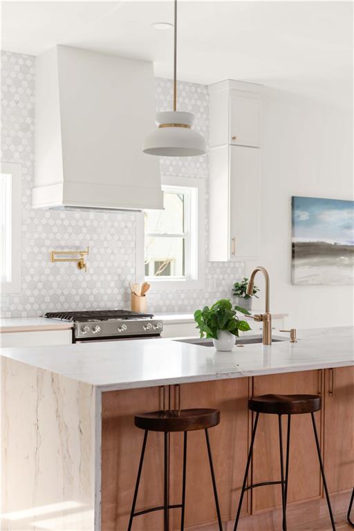 286 Sisson Avenue Northeast Atlanta, GA 30317 - Photo 16 of 56 a kitchen with stainless steel appliances a sink and cabinets